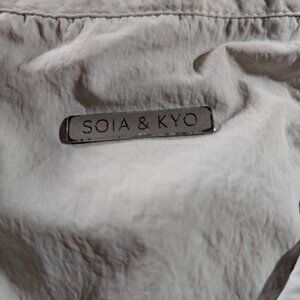 Designer lightweight jacket, oversized pockets, drawstring d..like new